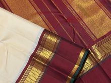 Sarasangi- Gorgeous Creamish White with Deep Brown Handwoven Pure Jari Korvai Kanjivaram Silk with beautiful borders green selvedges rich pallu and contrast woven blouse
