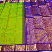 Sarasangi-Beautiful Bright Sneha Green with Violetish Purple Handwoven Pure Korvai Kanjivaram Silk with rich elephant and peacock motifs woven borders rich pallu and contrast woven blouse