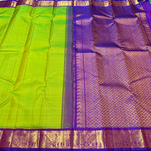 Sarasangi-Beautiful Bright Sneha Green with Violetish Purple Handwoven Pure Korvai Kanjivaram Silk with rich elephant and peacock motifs woven borders rich pallu and contrast woven blouse