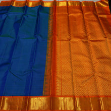 Sarasangi- Beautiful Peacock Blue with Orange Handwoven Pure Jari Korvai Kanjivaram Silk with beautiful borders rich pallu and contrast woven blouse
