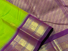 Vaibhogam -Mesmerizing Sneha Green with Deep Purple Handwoven Pure Jari Korvai Kanjivaram Silk with Mayil Chakram Buttas Woven Body with Gorgeous Temples woven intricate borders rich pallu and contrast woven blouse