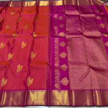 Vaibhogam -Gorgeous Dual tone Orange with Pink with Double Bird Buttas Handwoven Pure Jari Kanjivaram Silk with muthukattam woven body with rich bawanchi borders with green selvedges beautiful pallu with floral buttas woven with contrasting pink blouse