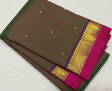 Sahana- Beautiful Double tone Manthulir Green with Purple Buttas Handwoven Pure Jari Kanjivaram Silk with beautiful double colored borders rich pallu and contrast woven blouse