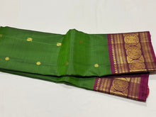 Meenakshi Green with Dark Wine Handwoven Pure Jari Kanjivaram Silk Saree with Buttas Woven Body rich borders pallu and contrast blouse beauty