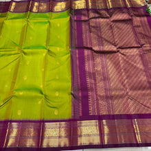Vaibhogam -Mesmerizing Sneha Green with Deep Purple Handwoven Pure Jari Korvai Kanjivaram Silk with Mayil Chakram Buttas Woven Body with Gorgeous Temples woven intricate borders rich pallu and contrast woven blouse