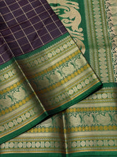 Saraswati- Gorgeous Coffee Brown with  Deep Emerald Green Handwoven Premium Zariless Kanjivaram Silk with beautiful muthukattam silk checked body with gorgeous varisaipet borders rich sorgavaasal pallu and contrast woven blouse