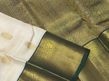 Stunning Ivory white with bottlegreen Handwoven Pure Jari Korvai Kanjivaram Silk Saree with gorgeous Gandaberunda motifs woven body rich borders pallu and contrast woven blouse