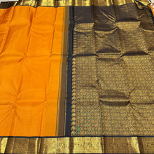 Sarasangi - Gorgeous Mustard with Black Handwoven Pure Jari Korvai Kanjivaram Silk with beautiful black double parrots woven borders with rich pallu and contrast woven blouse