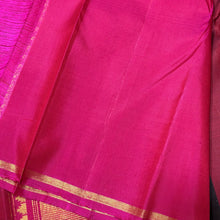 Saranga- Gorgeous Handwoven Pure Kanjivaram Silk in a beautiful Maroon and Black with Zari Striped body with small borders rich pallu and contrast woven blouse