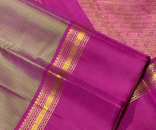 Sahana- Gorgeous Manthulir Green with Deep Pink Muthukattam Handwoven Pure Jari Kanjivaram Silk with beautiful body spaced borders rich pallu and contrast woven blouse