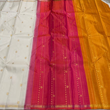 Saranga- Stunning Offwhite with Golden Mustard and Orange Pink Handwoven Pure Jari Small borders kanjivaram silk ,Double Pallu with beautiful mayil chakram buttas woven body rich pallu and contrast zari striped blouse