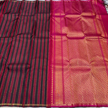 Saranga- Gorgeous Handwoven Pure Kanjivaram Silk in a beautiful Maroon and Black with Zari Striped body with small borders rich pallu and contrast woven blouse