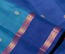 Sahana- Beautiful Blue with dark teal blue combination in a handwoven pure Jari Kanjivaram Silk with buttas woven body with rich borders beautiful pallu and contrast woven blouse