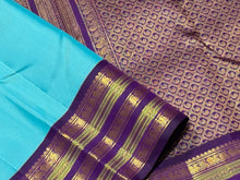 Gorgeous Turquoise Blue with Deep Purple  Kai Korvai Handwoven Pure Jari Kanjivaram Silk Saree with intricate meenakari varisaipet borders with rich pallu and contrast woven blouse beauty