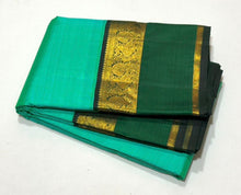 Gorgeous Pastel Green with Dark Bottle Green Kai Korvai Handwoven Pure Jari Kanjivaram Silk with beautiful spaced borders rich seer pallu and contrast woven blouse