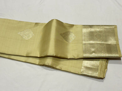 Pastel Green Tinted Cream with Silver Jari Buttas Handwoven Pure Kanjivaram Silk Saree with rich borders pallu and self colored blouse beauty