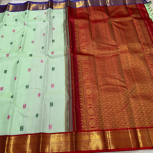 Vaibhogam- Gorgeous Pista Green with Violetish blue and Burgundy Maroon Handwoven Pure 2g Jari Korvai Kanjivaram Silk with Pattu Buttas woven body rich borders ganga Jamuna beautiful pallu and contrast woven blouse