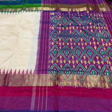 Arabhi- Stunning Offwhite with Ganga Jamuna temples Handwoven Pure Double Ikat Silk with beautiful borders with rich ikat style woven beautiful pallu with contrast blouse