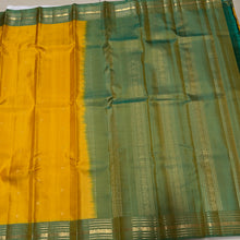 Sahana- Gorgeous Yellow with Dual tone Green Buttas Handwoven Pure Kanjivaram Silk with beautiful borders rich pallu and contrast woven blouse