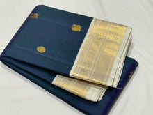 Stunning Deep Sapphire Blue (dual tone deep blue short with green) with Offwhite Handowen Pure Jari Korvai Kanjivaram Silk Saree with Mayil Chakram Buttas woven body with rich and very beautifully woven borders gorgeous pallu and contrast woven blouse