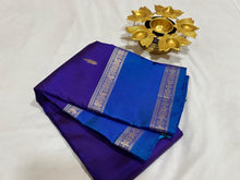 Violetish Blue with Lapis Blue Handwoven Pure Korvai Kanjivaram Silk Saree with Buttas Body Doublepet Borders rich Simhayazhi Pallu and Contrast Blouse