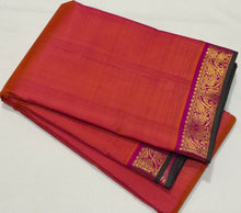 Nayaki- Gorgeous Orange with Pink Handwoven Pure Jari Kanjivaram Silknwith Green selvedges beautiful rich seer pallu and contrast woven pink blouse