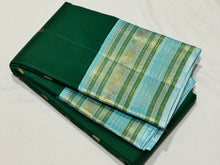 Mindblowing Handwoven Pure Korvai Kanjivaram Silk Saree in Bottle Green with Ice Blue combination with buttas woven body rich varisaipet meenakari borders beautiful pallu and contrast woven blouse
