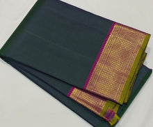 Nayaki- Gorgeous Deep Sapphire Green  with Dark Magenta  Handwoven Pure Kanjivaram Silk with beautiful bawanchi borders with green selvedges with rich pallu and contrast woven blouse
