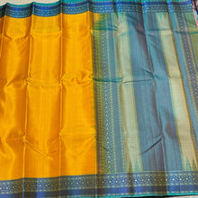 Yellow with Turquoise Green Blue Handwoven Pure Zariless Self Striped Soft Kanjivaram Silk With Buttas Body rich pallu and Jacquard Blouse
