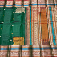 Dark Bottle Green with Manthulir buttas with Corner Buttas Konia Pallu with Varisaipet borders Handwoven Pure Zariless Kanchipuram Silk Saree Beauty