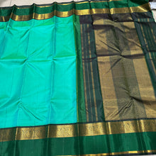 Gorgeous Pastel Green with Dark Bottle Green Kai Korvai Handwoven Pure Jari Kanjivaram Silk with beautiful spaced borders rich seer pallu and contrast woven blouse