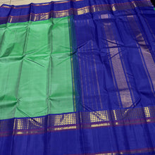 Sarasangi- Beautiful Pastel Green with Royal Blue Handwoven Pure Jari Korvai Kanjivaram Silk with beautiful borders rich seer pallu and contrast woven blouse