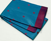 Nayaki- Beautiful Ananda Blue with Red Handwoven Pure Zariless Kanjivaram Silk with lovely banarasi pet matte finish borders with silk thread buttas rich pallu and contrast red blouse